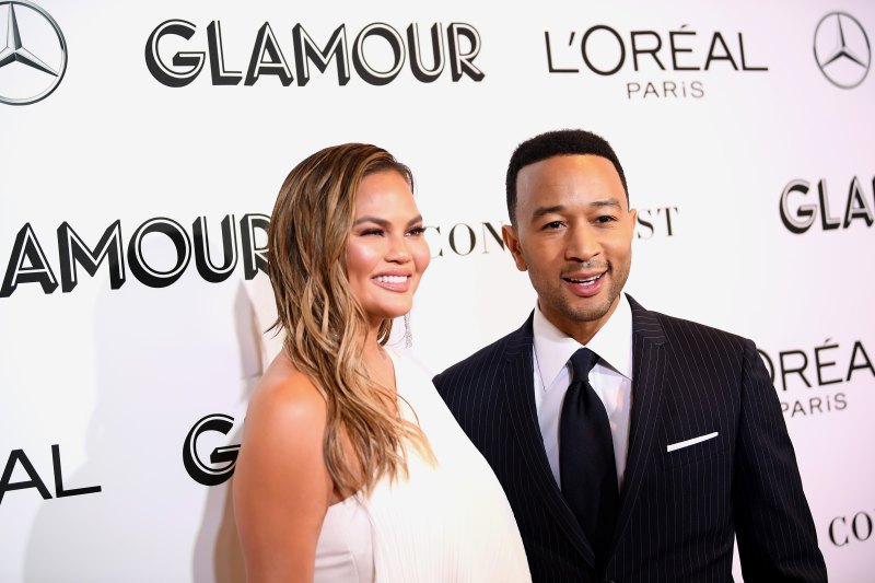 Chrissy Teigen wearing all white with John Legend