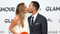 Chrissy Teigen kissing John Legend