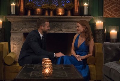 Colton Underwood with Elyse wearing a blue dress