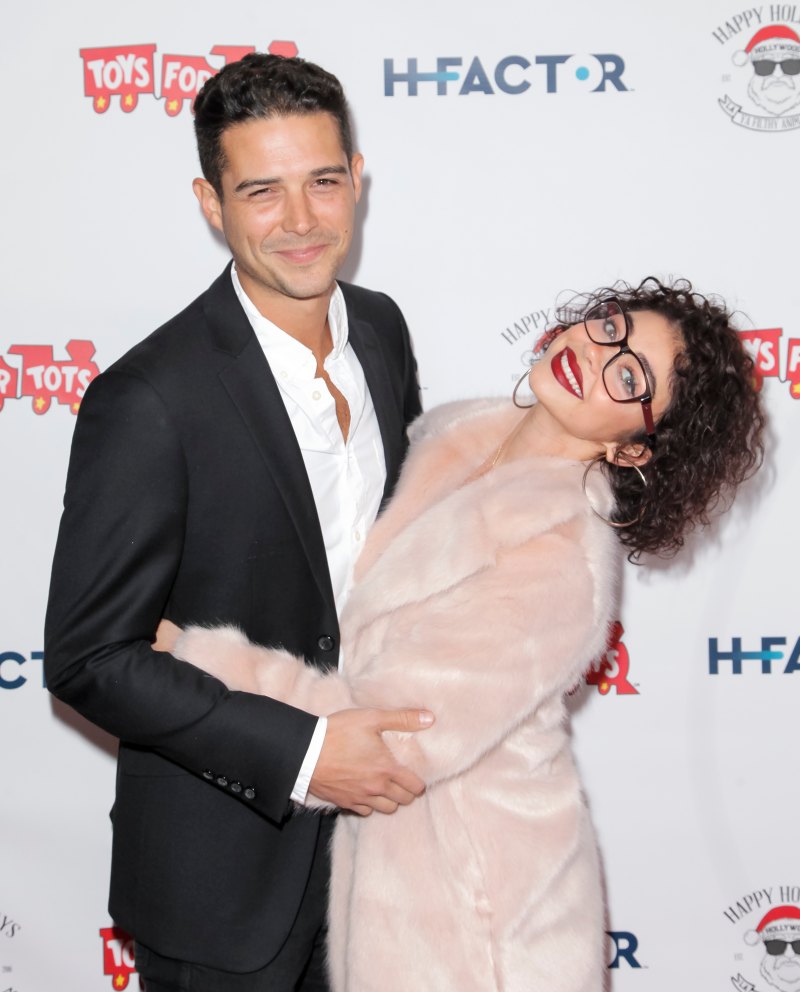 Sarah Hyland with glasses and curly hair with boyfriend Wells Adams