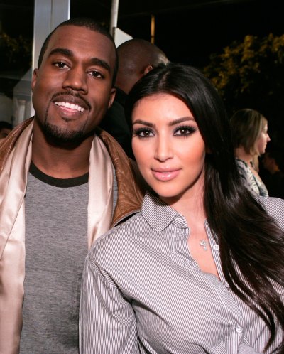 Kanye West posing with Kim Kardashian in 2007
