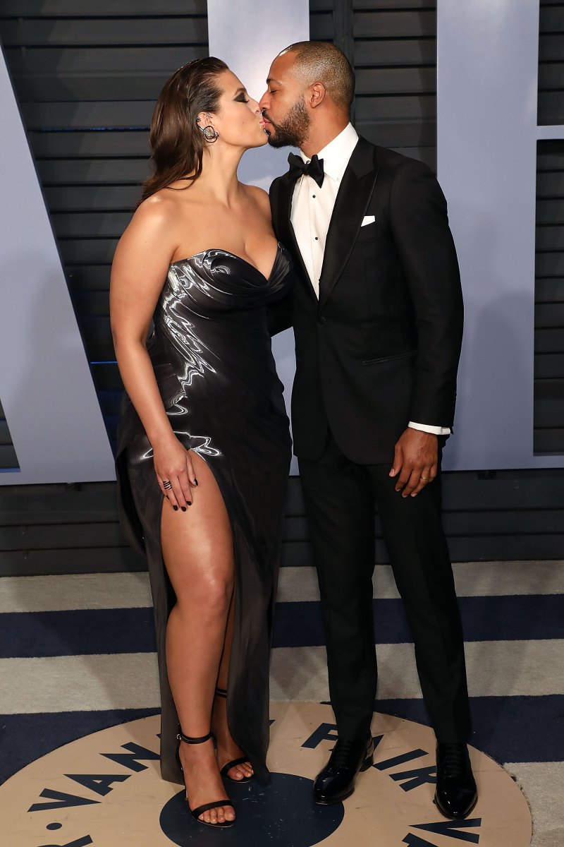 Ashley Graham kissing her husband Justin Ervin