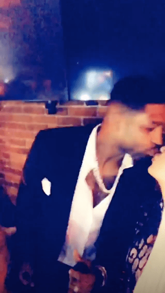 Khloe Kardashian and Tristan Thompson kissing on New Year's