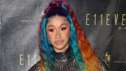 Cardi B posing with rainbow hair