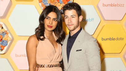 Priyanka Chopra posing next to husband Nick Jonas