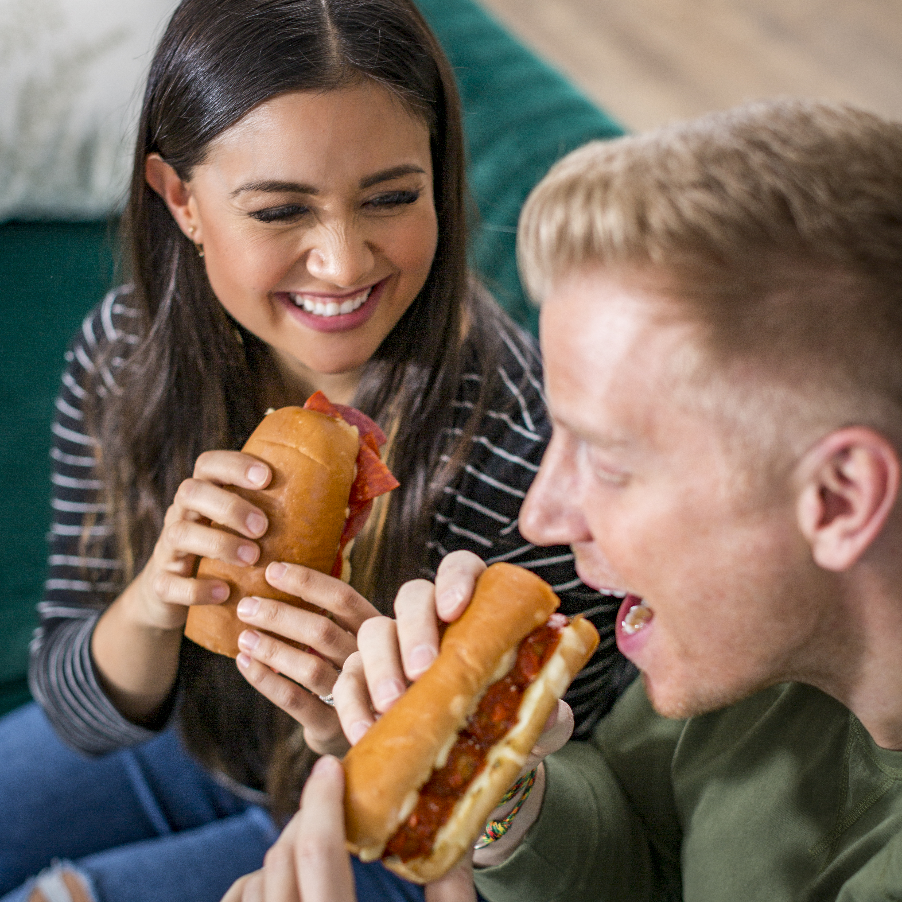 Sean and Catherine Lowe eat a Subway sandwich
