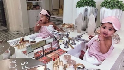 Khloe Kardashian's daughter True Thompson playing with makeup in the sink.