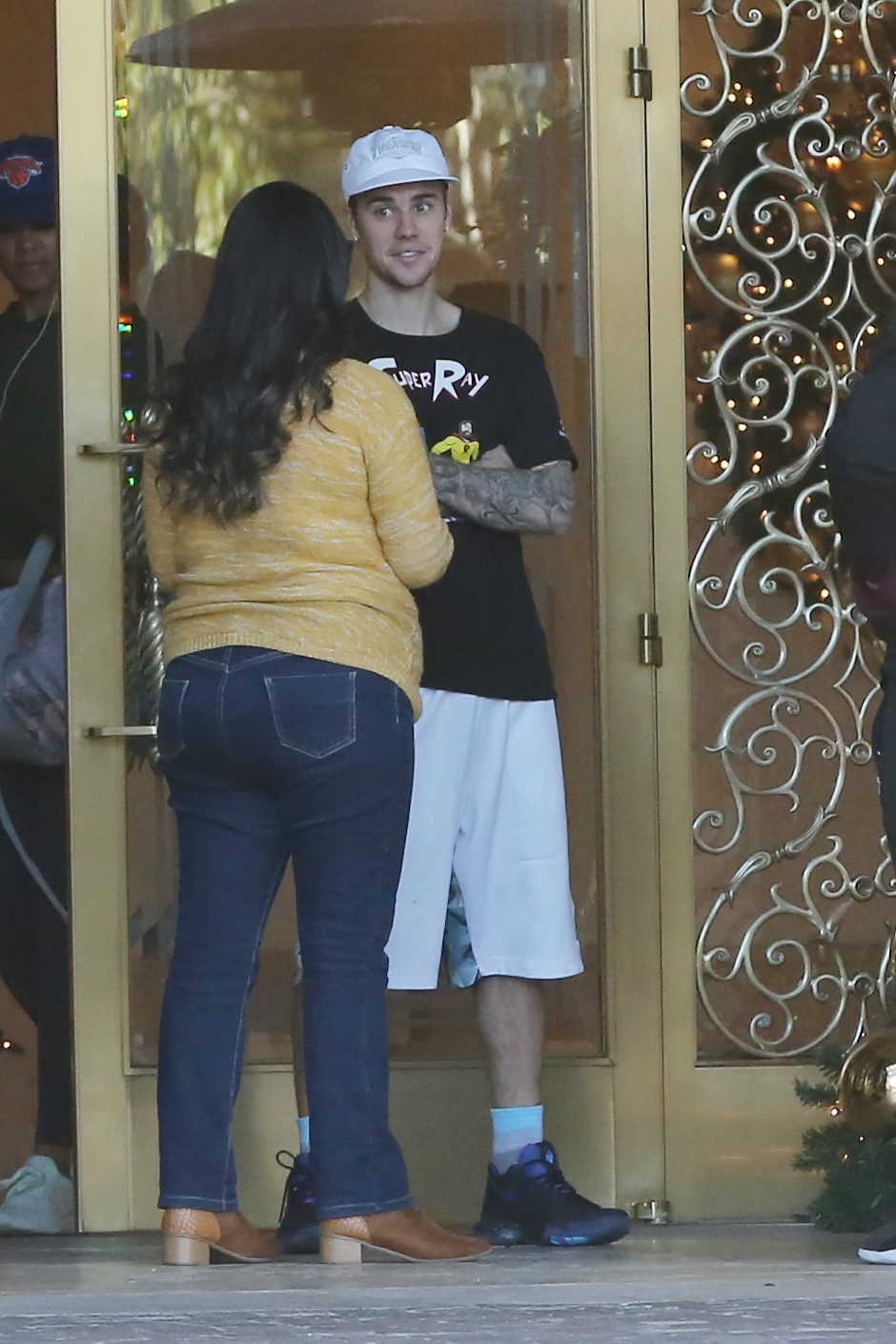 justin bieber all smiles at hotel with fans