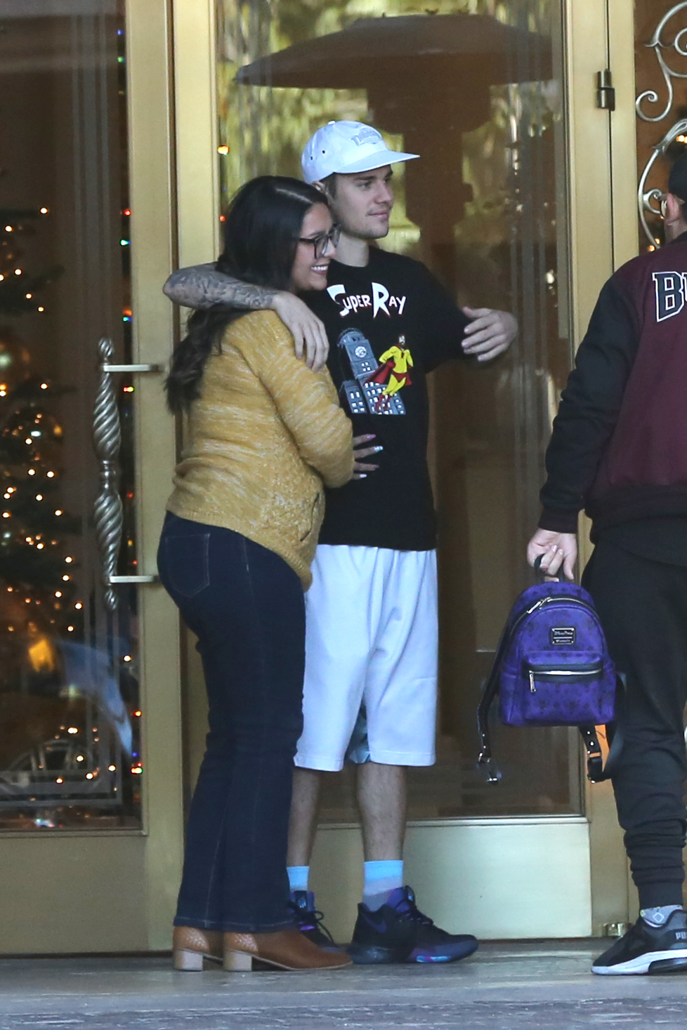 justin bieber all smiles at hotel with fans