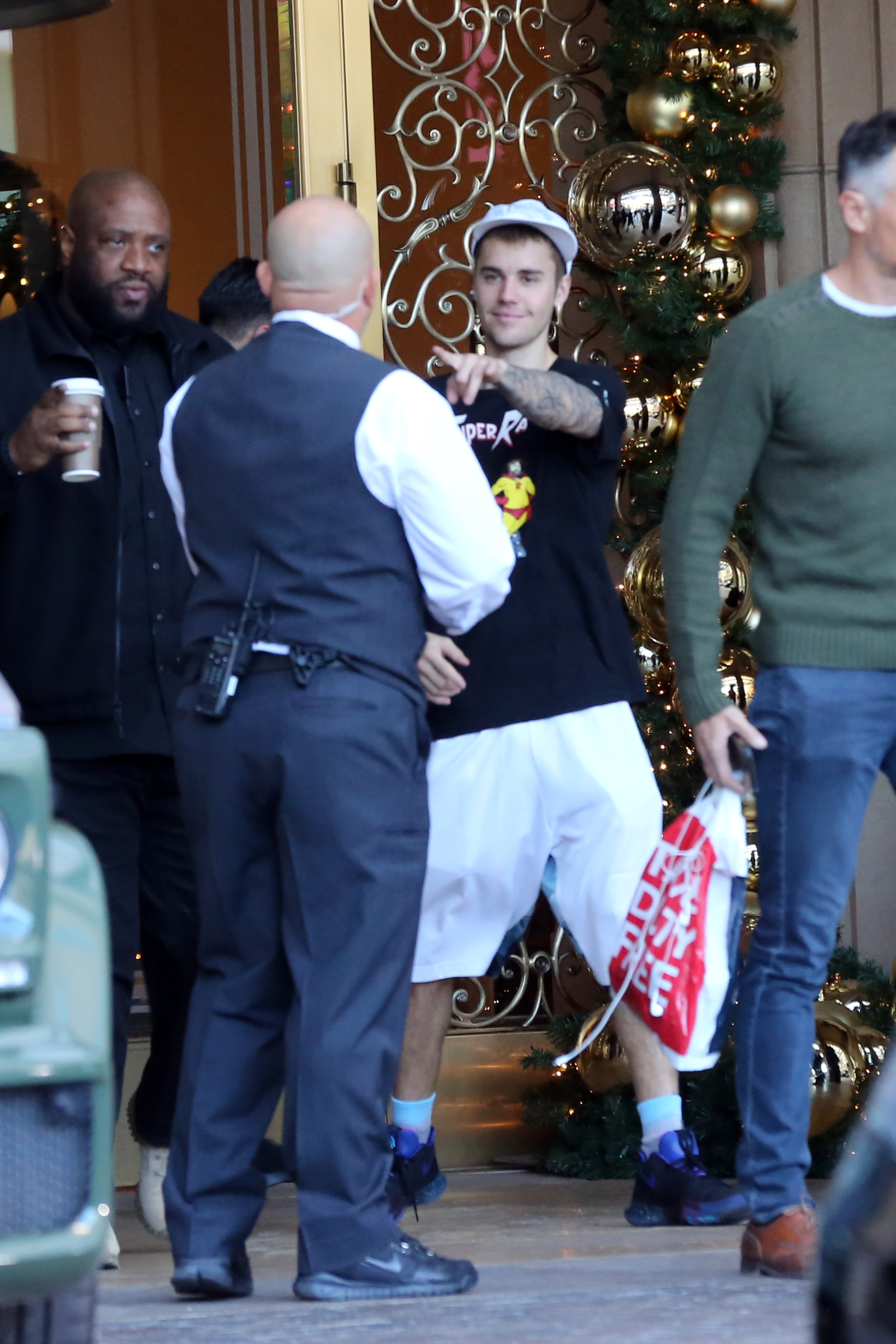 justin bieber all smiles at hotel with fans