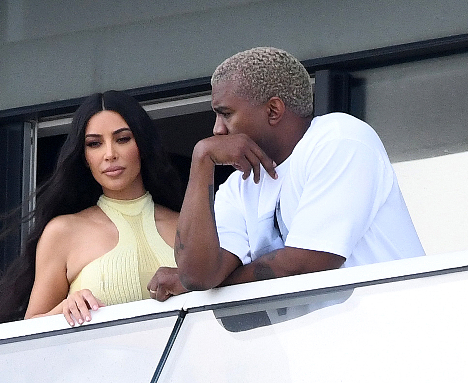 Kim Kardashian And Kanye West share Romantic Smooch At The Condo He Bought Her For Christmas