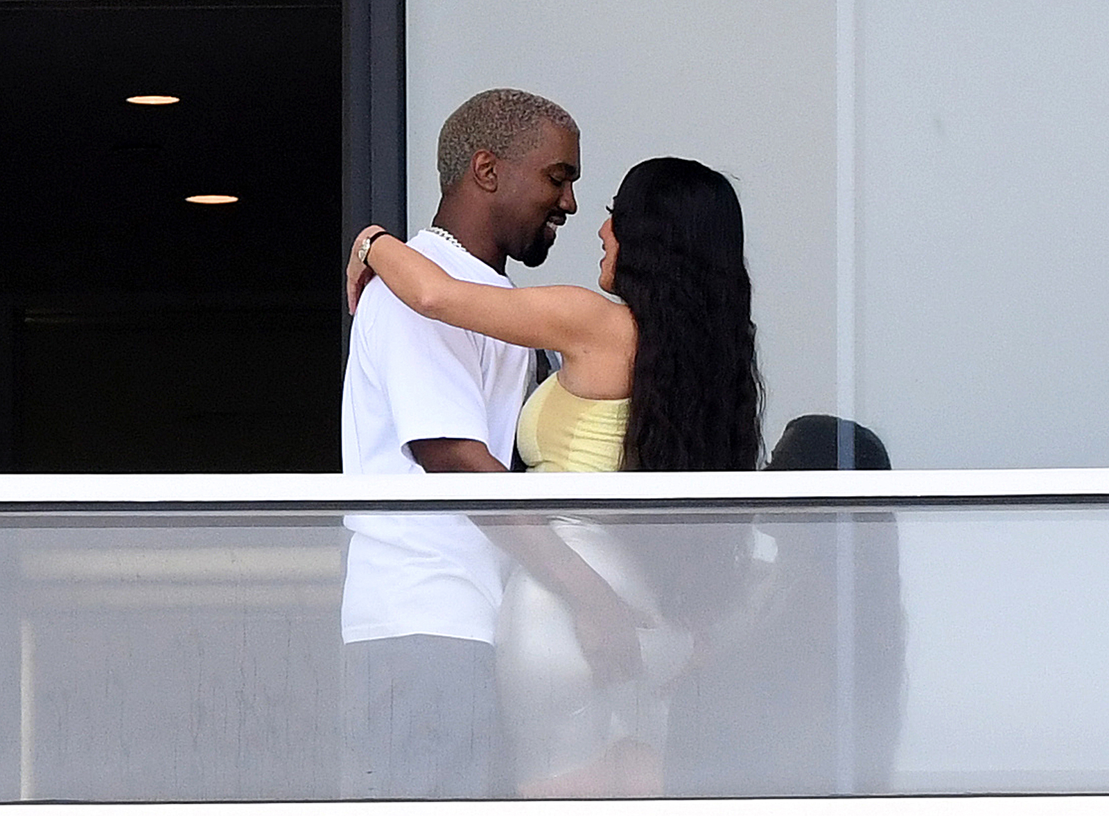 Kim Kardashian And Kanye West share Romantic Smooch At The Condo He Bought Her For Christmas