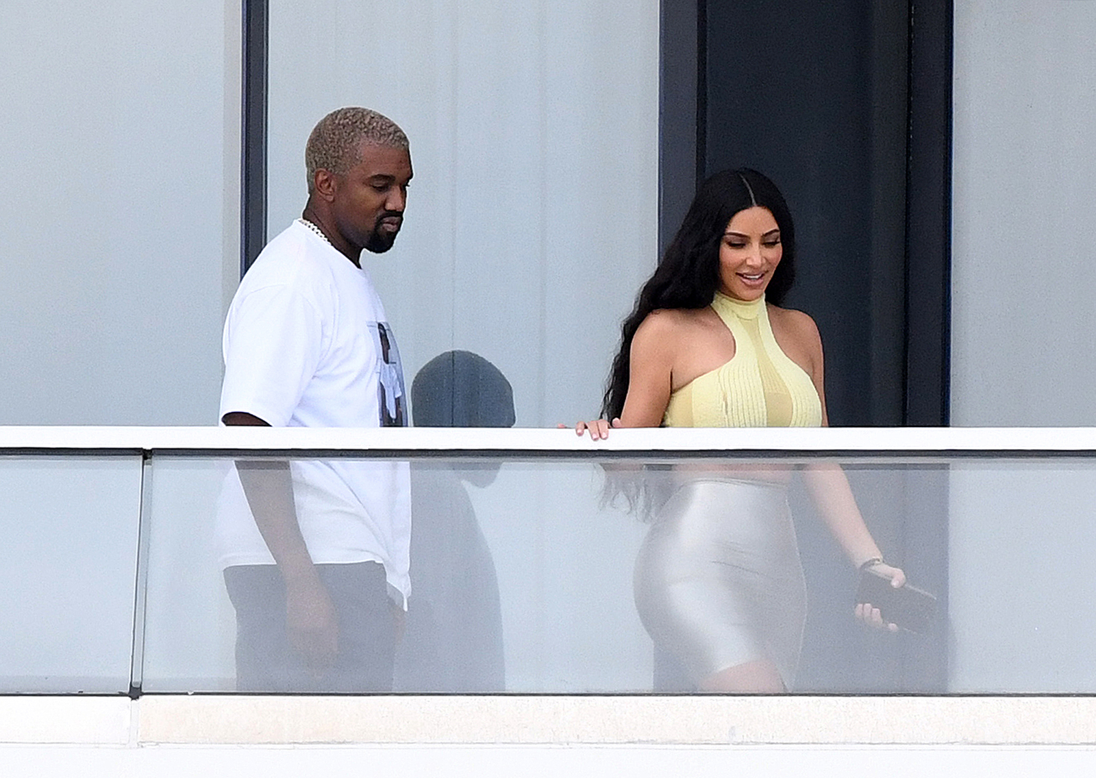 Kim Kardashian And Kanye West share Romantic Smooch At The Condo He Bought Her For Christmas