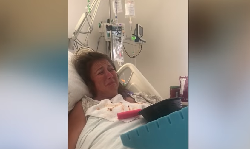 Abby Lee Miller in a hospital bed crying