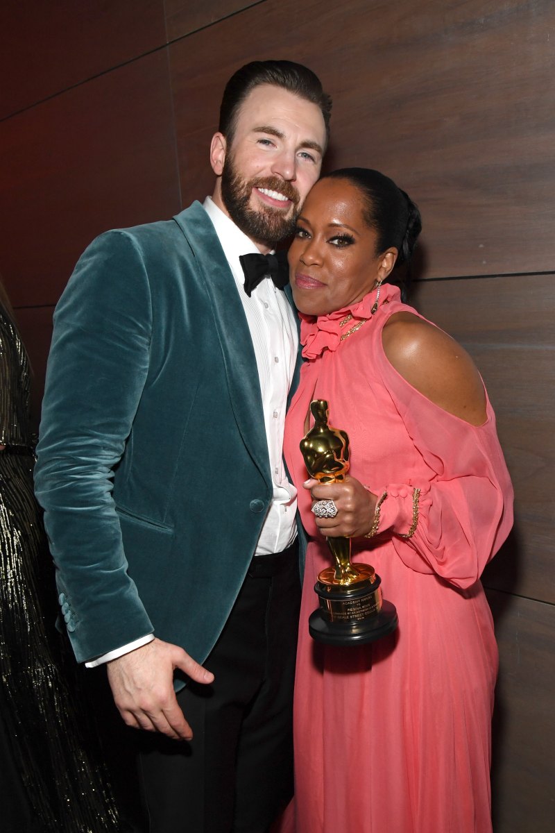 Chris Evans and Regina King 2019 Vanity Fair Oscar Party Hosted By Radhika Jones - Inside