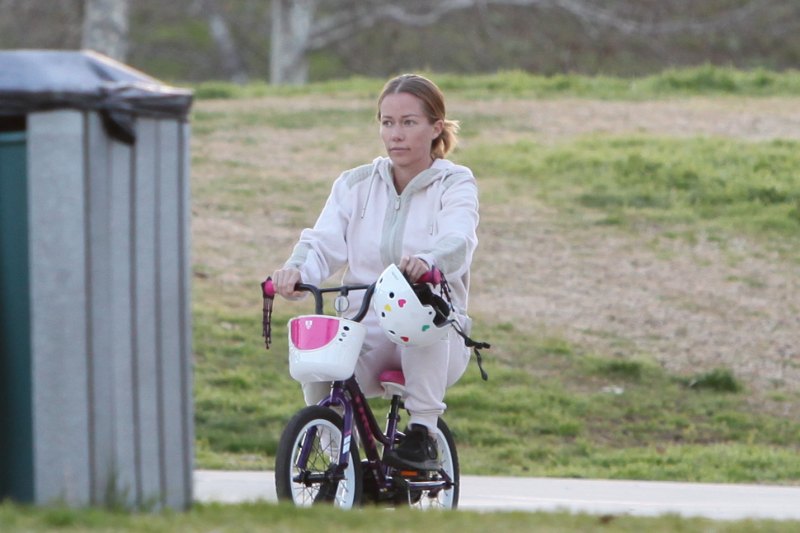 Kendra Wilkinson and Hank Baskett reunite for co-parenting their kids at the park and watch Alijah learn how to ride a bicycle.