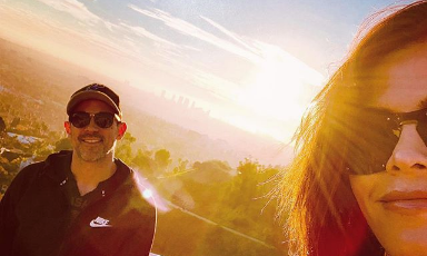 Jenna Dewan and Steve Kazee posing for a selfie in front of a sunset