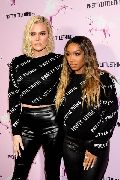 Khloe Kardashian posing with Malika Haqq 