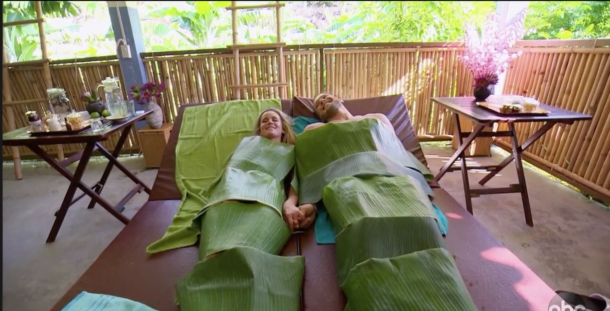Colton and Hannah wrapped in a leaf