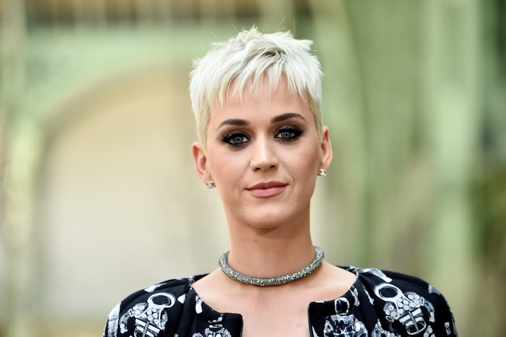katy perry in front of green