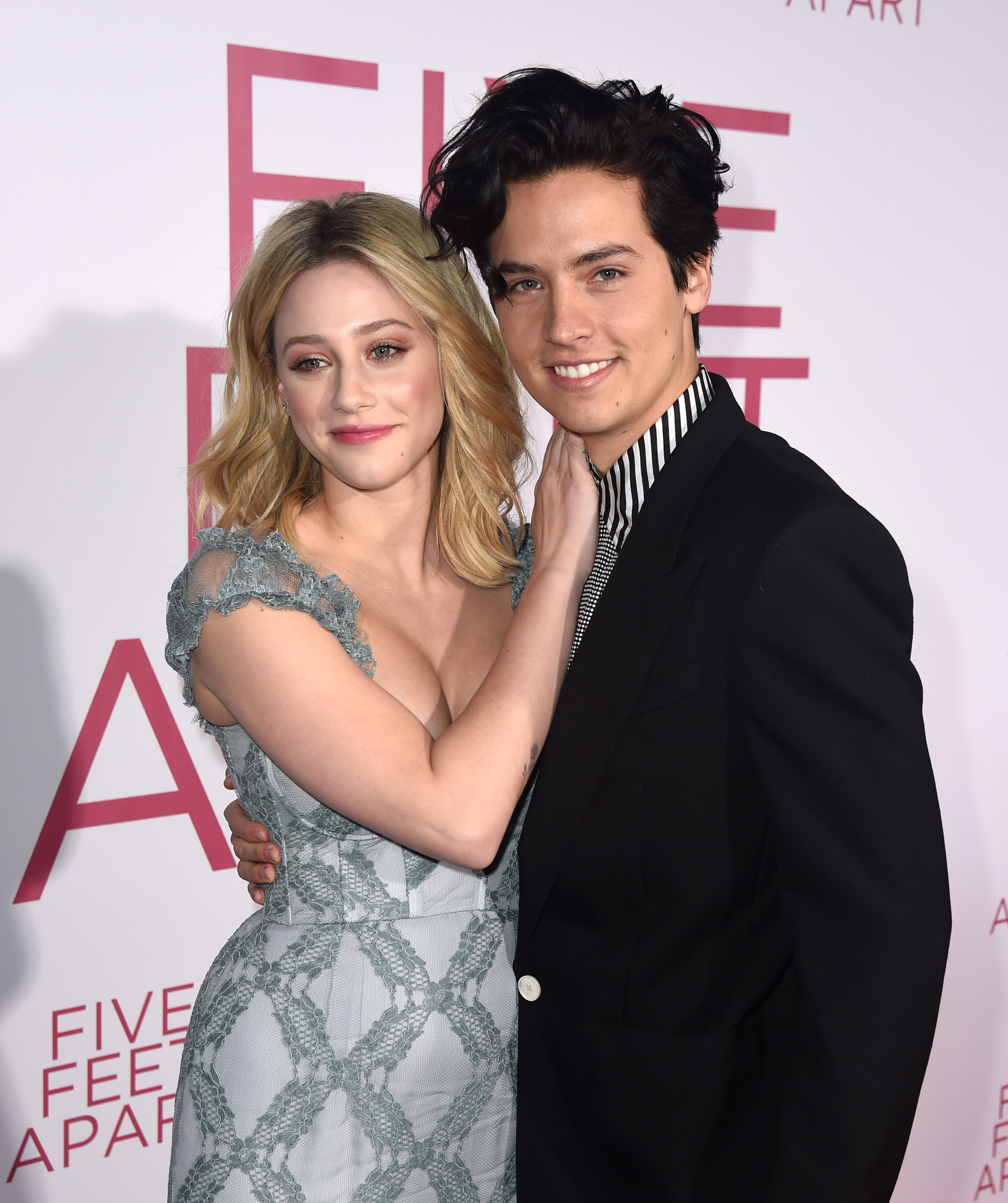 Lili Reinhart and Cole Sprouse posing