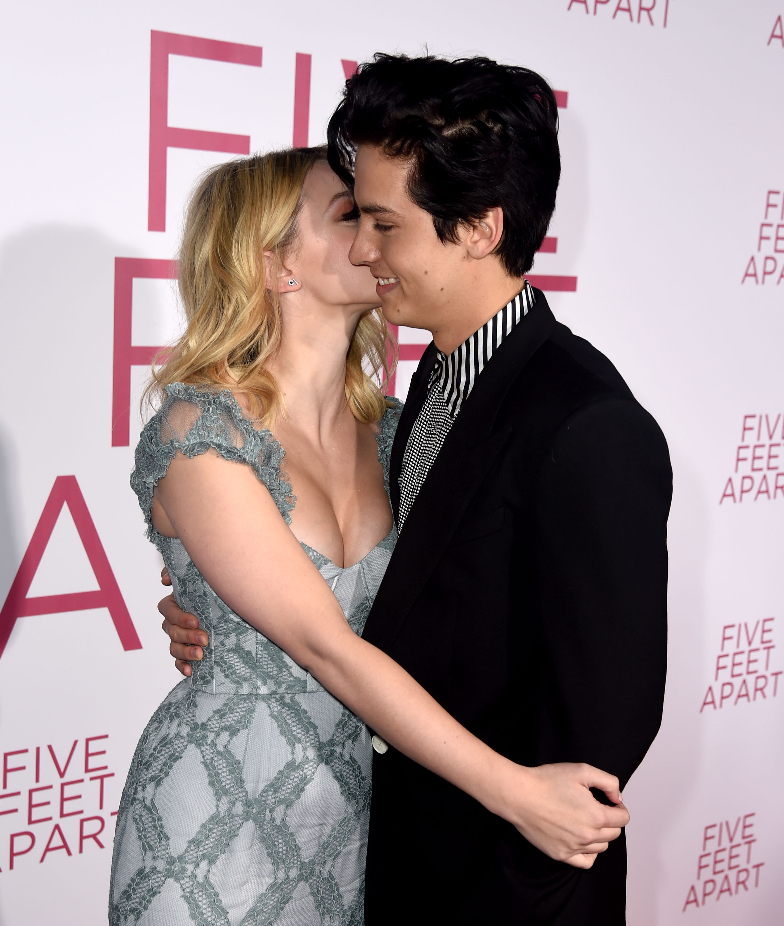 Lili Reinhart and Cole Sprouse posing