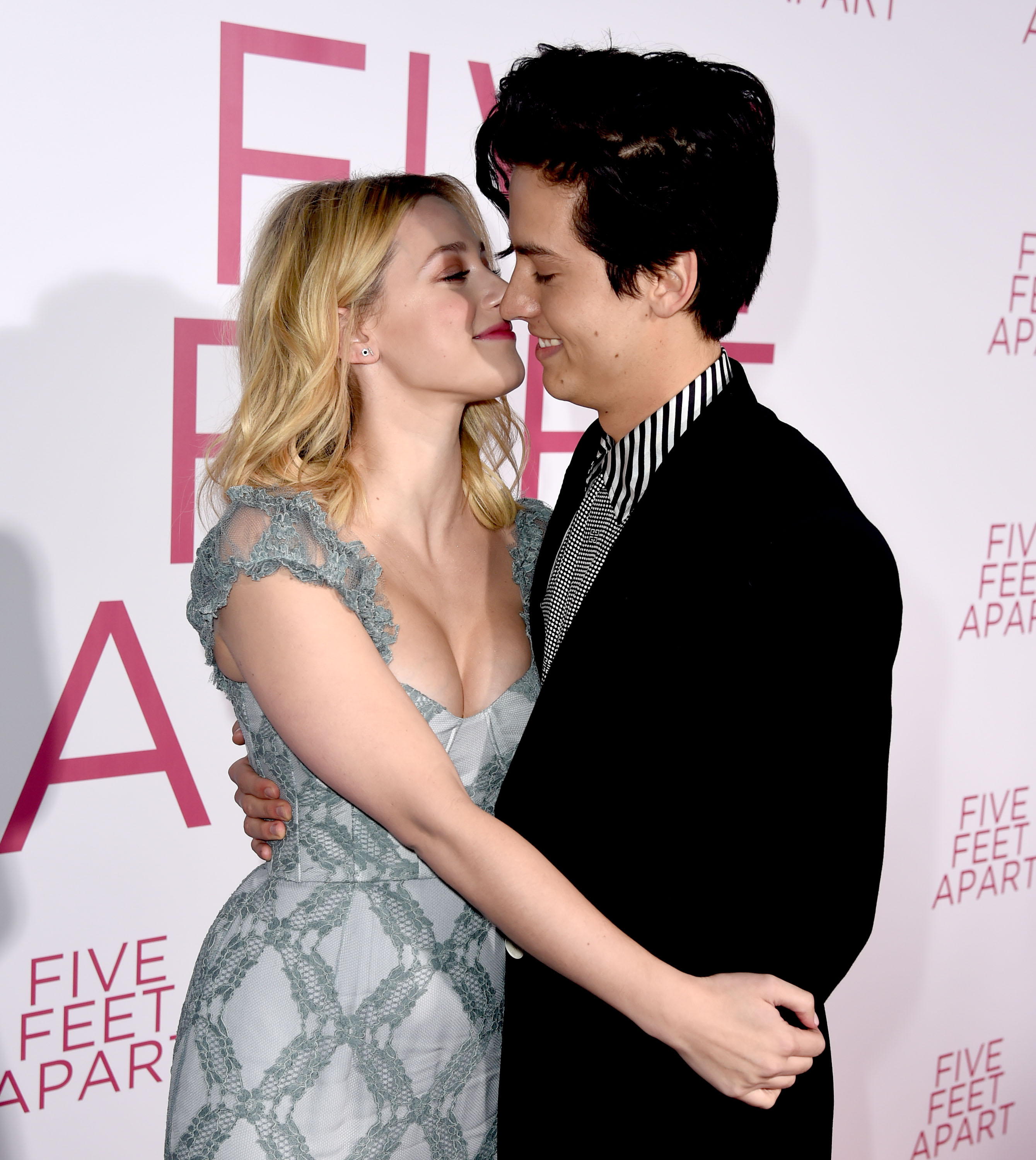Lili Reinhart and Cole Sprouse posing