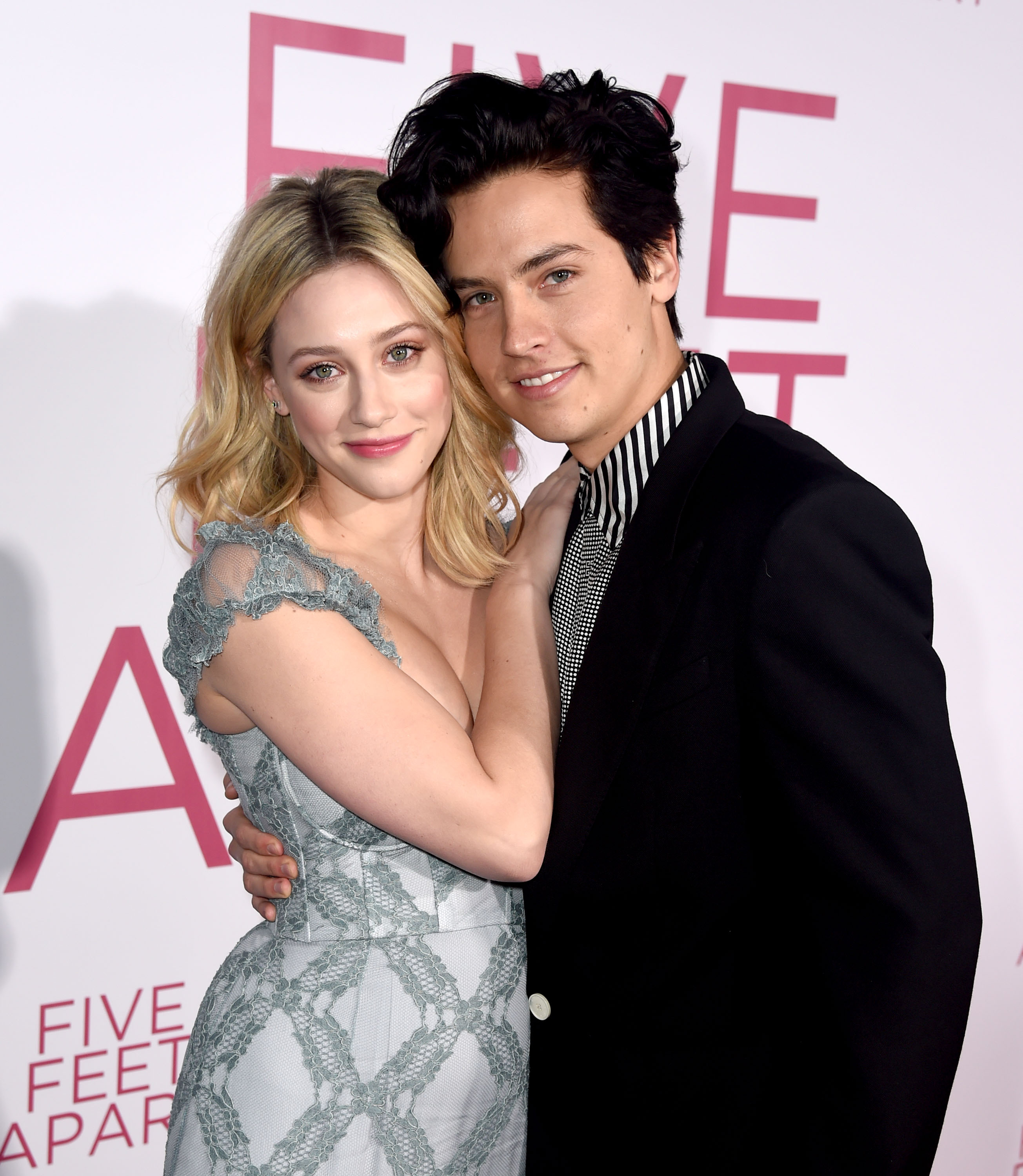 Lili Reinhart and Cole Sprouse posing