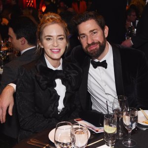 John Krasinski posing with Emily Blunt