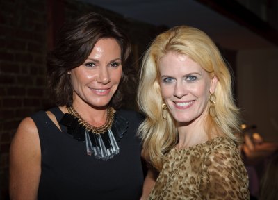 alex mccord with luann wearing a black dress