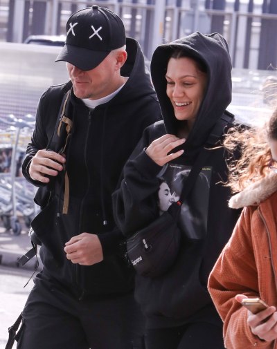 Jessie J and Channing Tatum holding hands through Heathrow airport.