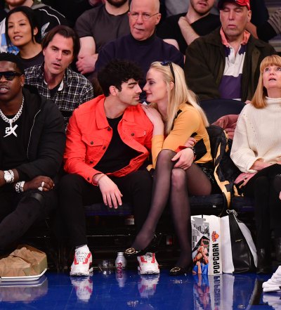 Joe Jonas and Fiancee Sophie Turner Share a Smooch While Courtside at Knicks Game