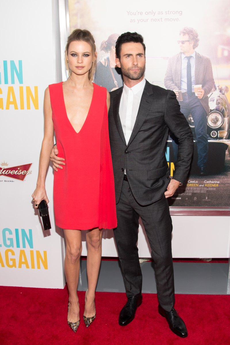 adam levine and behati prinsloo wearing a red dress