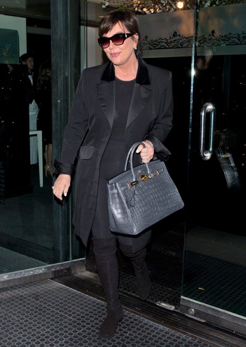Kris Jenner walking in Beverley Hills wearing an all black outfit.
