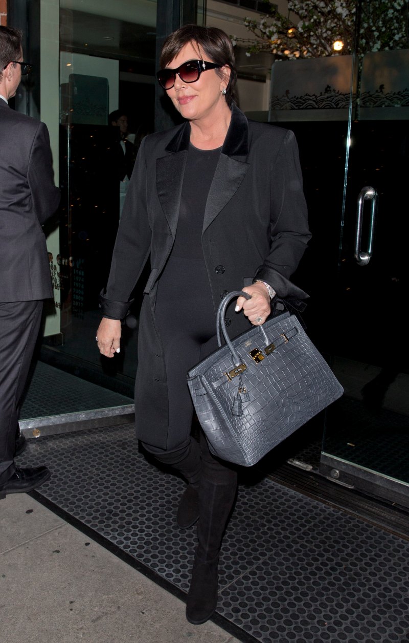 Kris Jenner walking in Beverley Hills wearing an all black outfit.