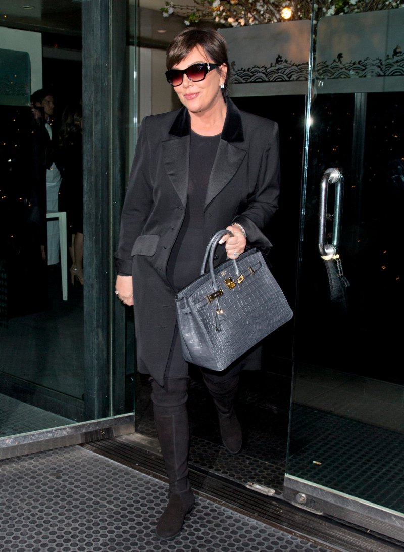 Kris Jenner walking in Beverley Hills wearing an all black outfit.