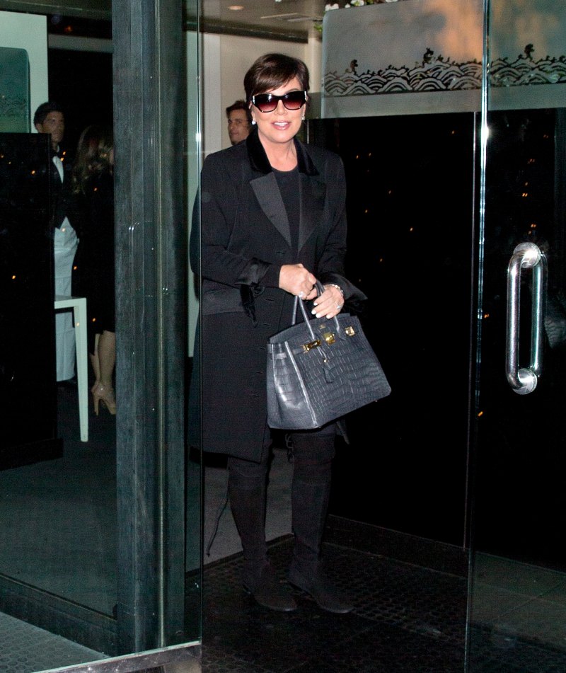 Kris Jenner walking in Beverley Hills wearing an all black outfit.