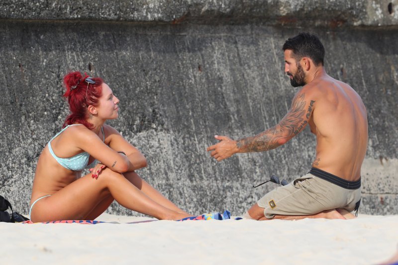 dwts sharna burgess in bikini talking to new man
