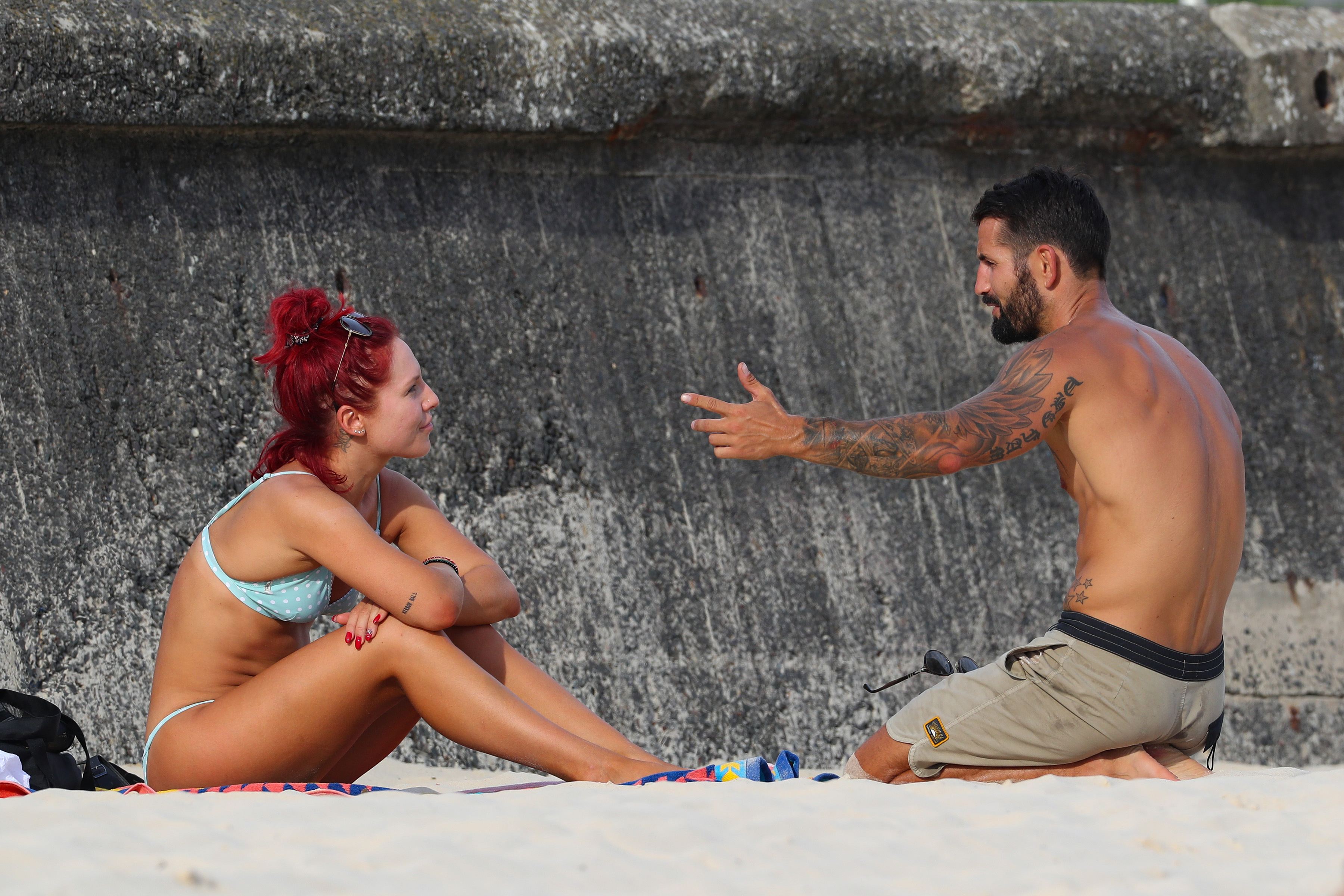 dwts sharna burgess in bikini talking to new man