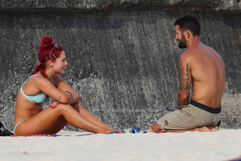 dwts sharna burgess in bikini talking to new man