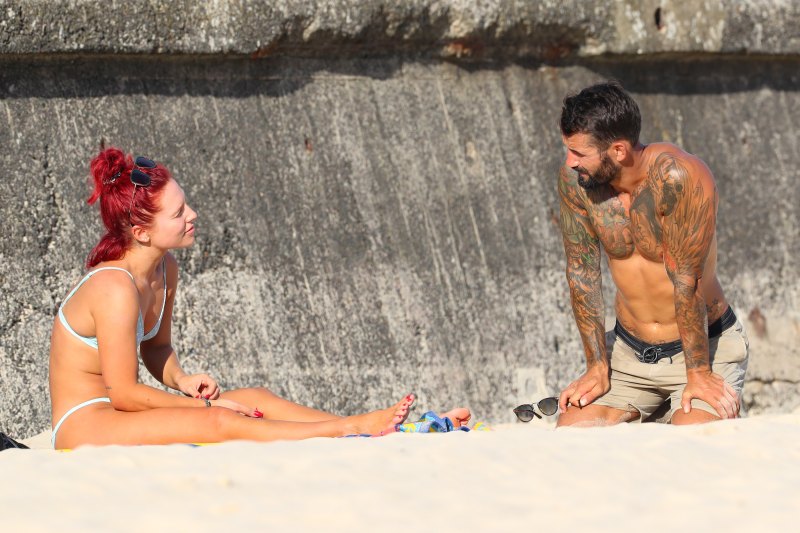 dwts sharna burgess in bikini talking to new man
