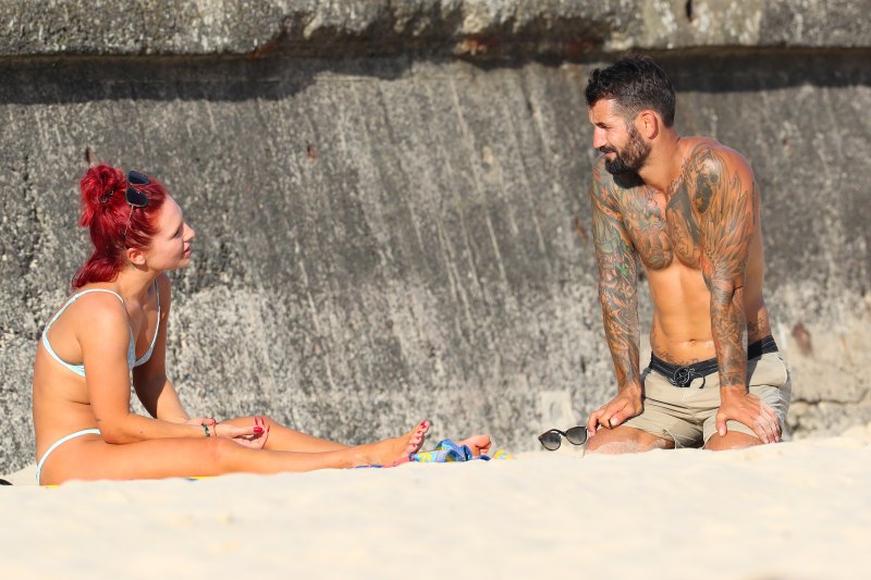 dwts sharna burgess in bikini talking to new man