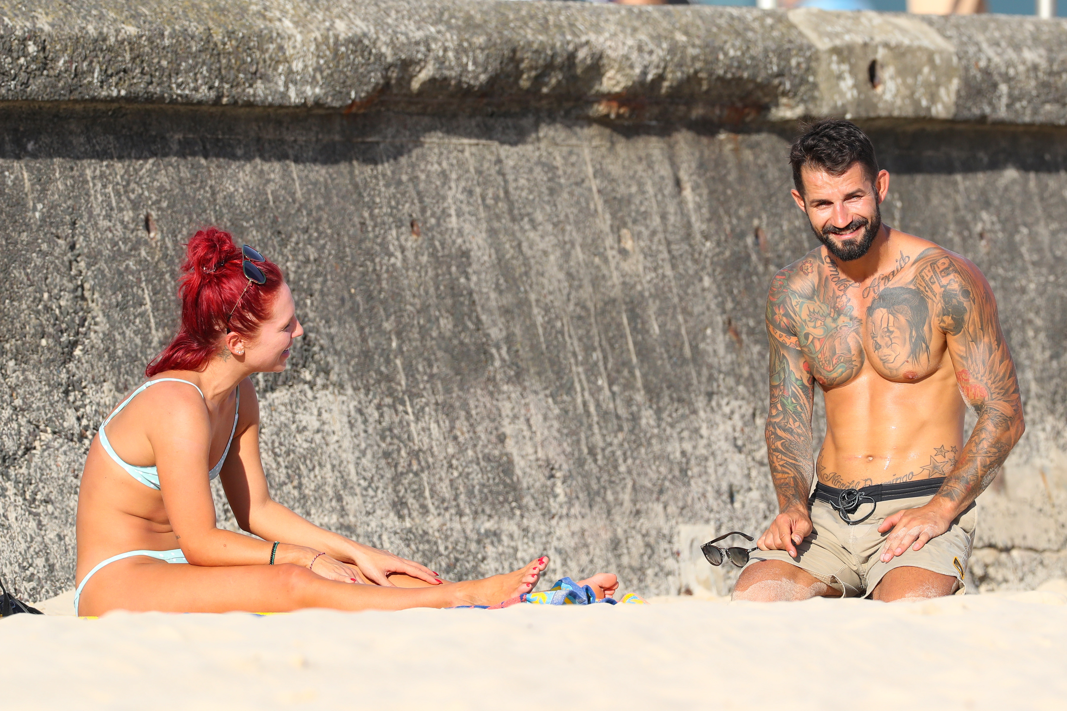 dwts sharna burgess in bikini talking to new man
