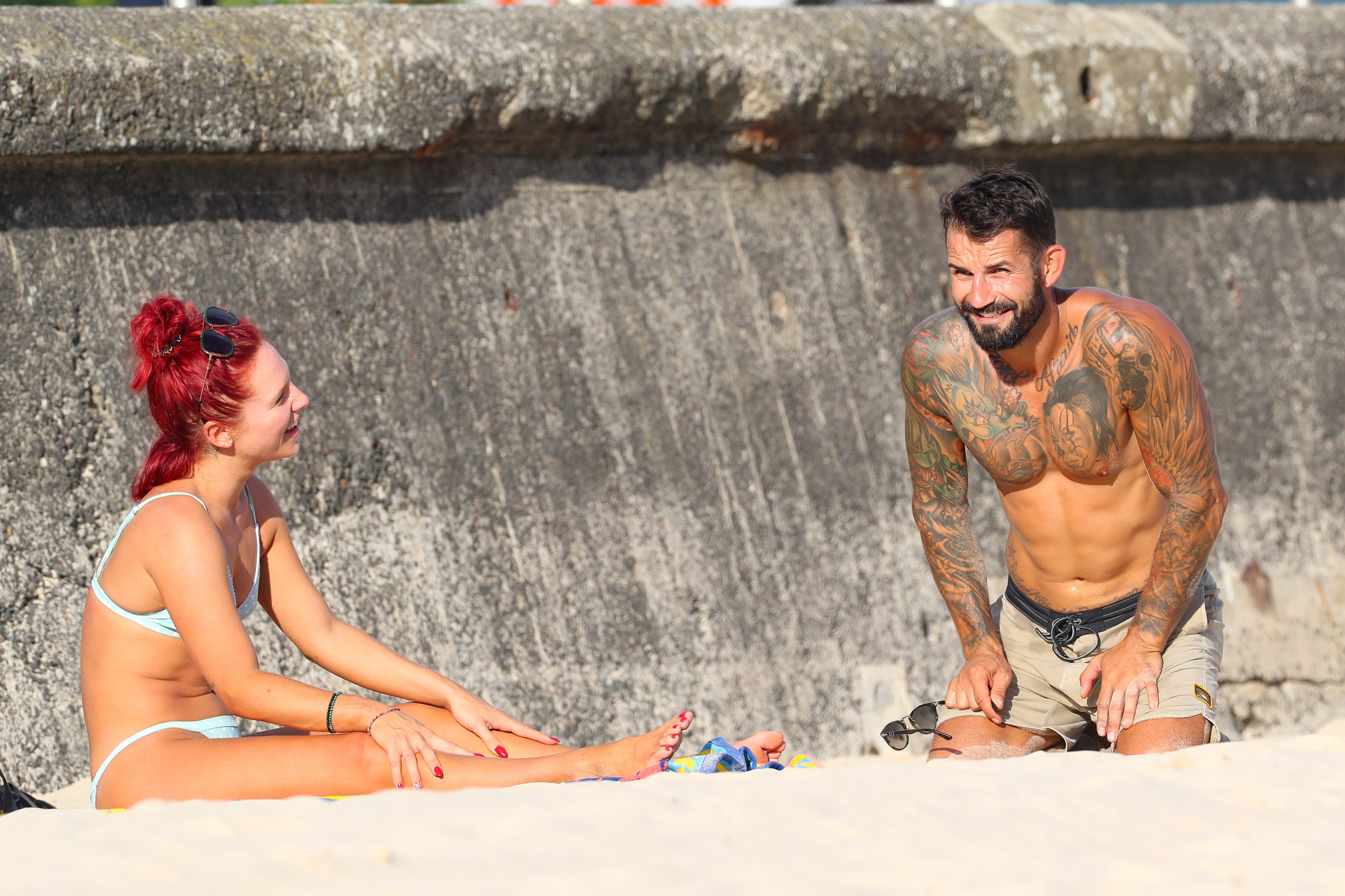 dwts sharna burgess in bikini talking to new man
