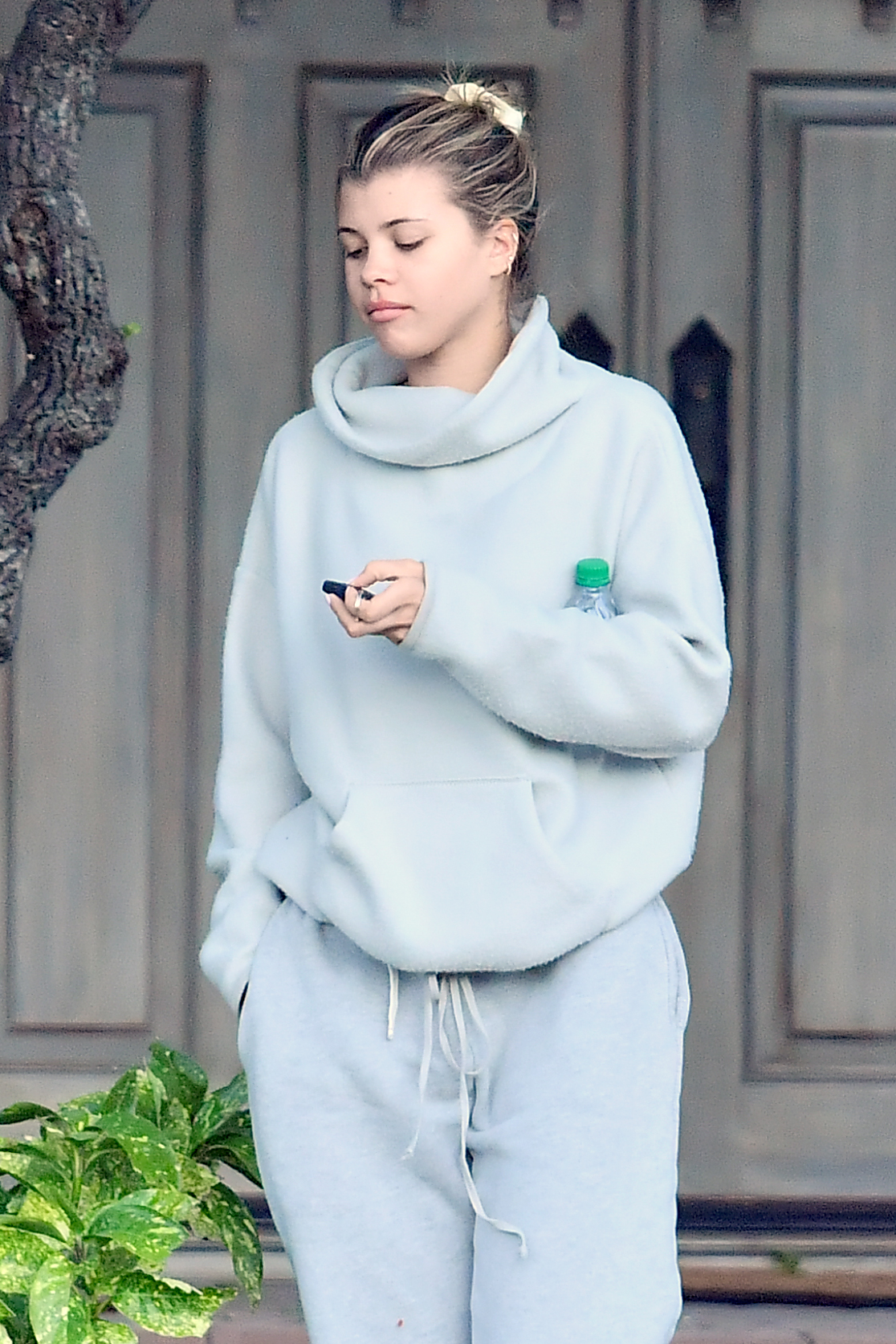 Sofia Richie wearing grey sweats