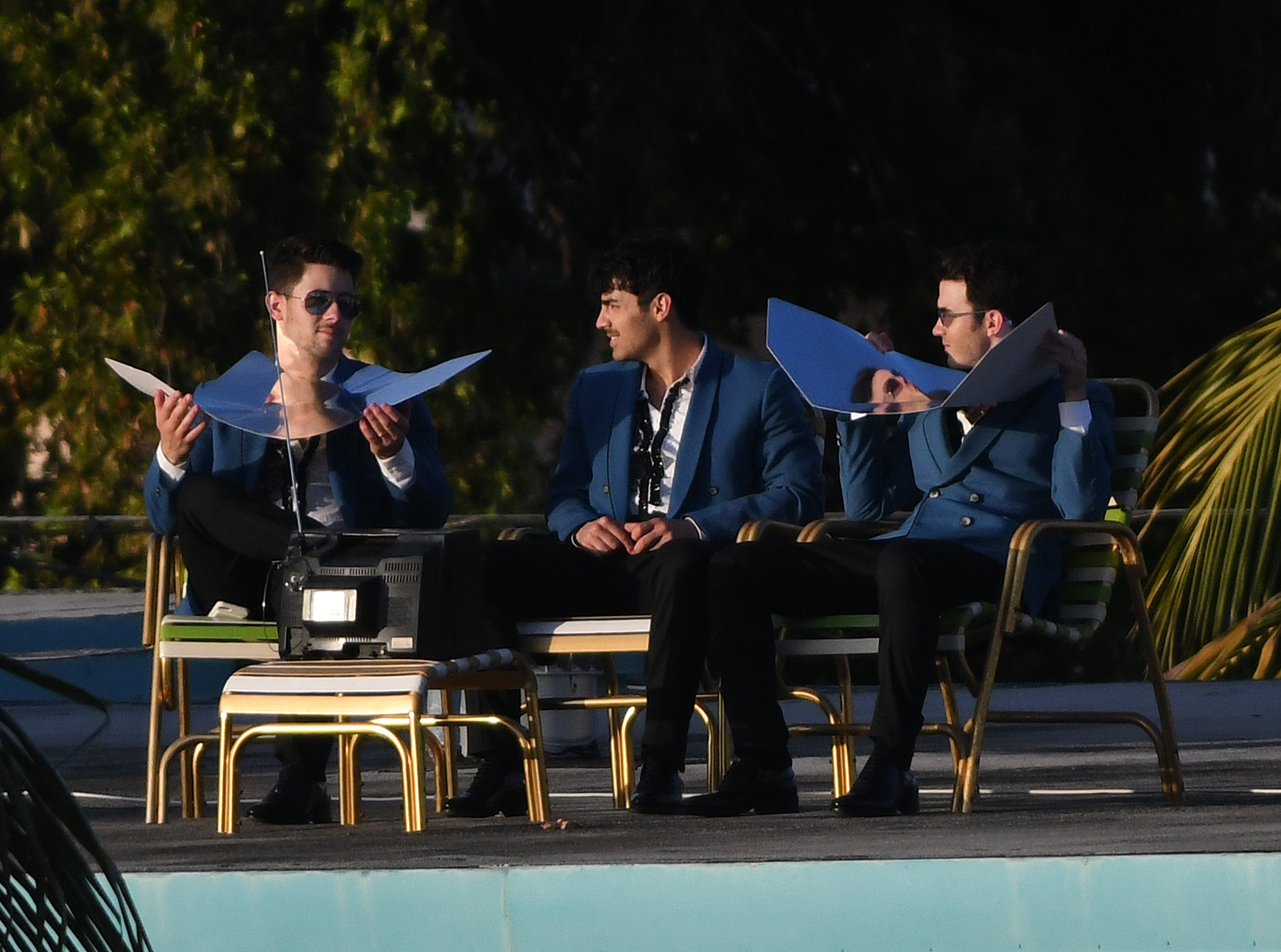 The Jonas Brothers reunite as a band to film a music video in Miami Beach