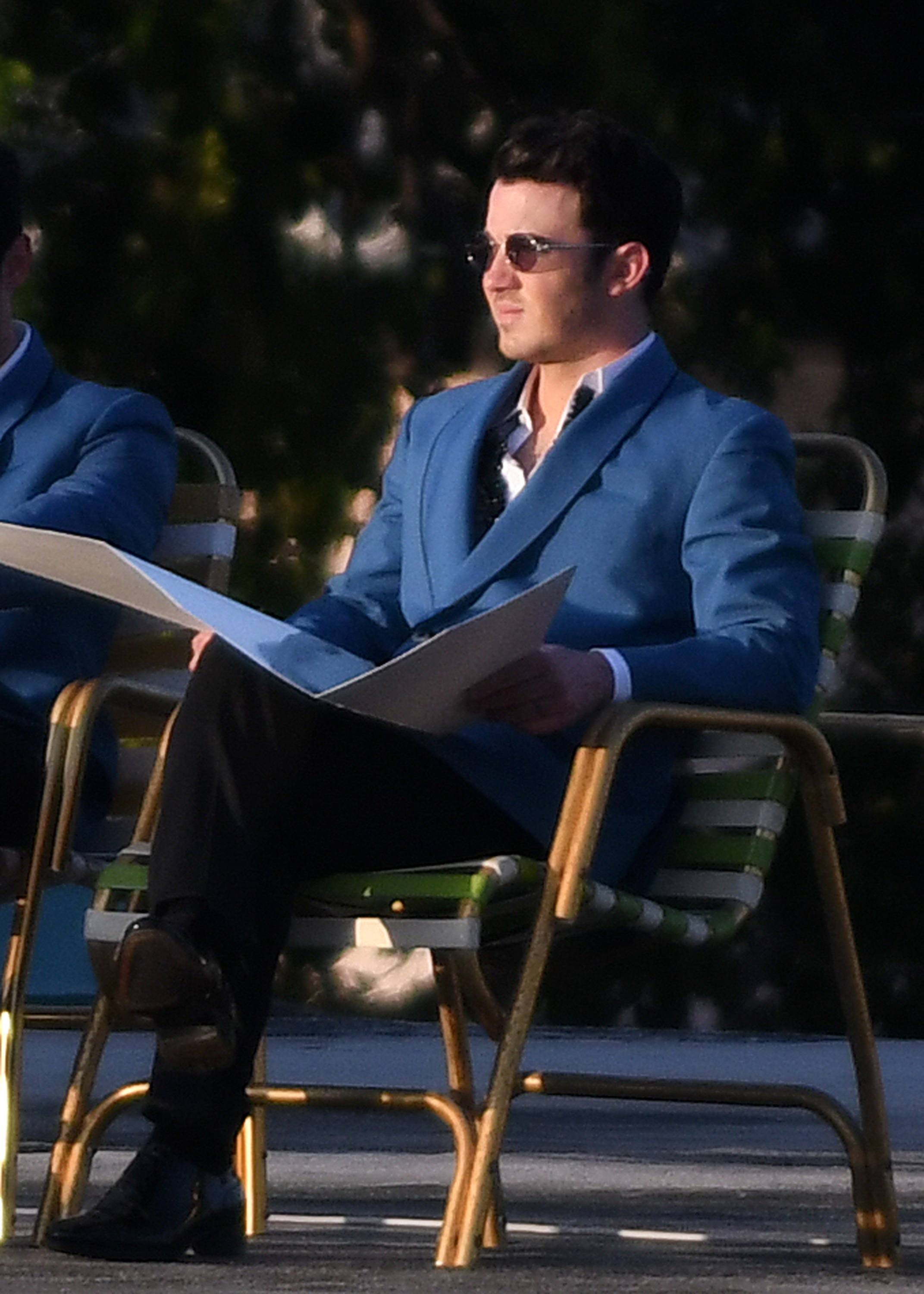 Kevin Jonas filming a new music video