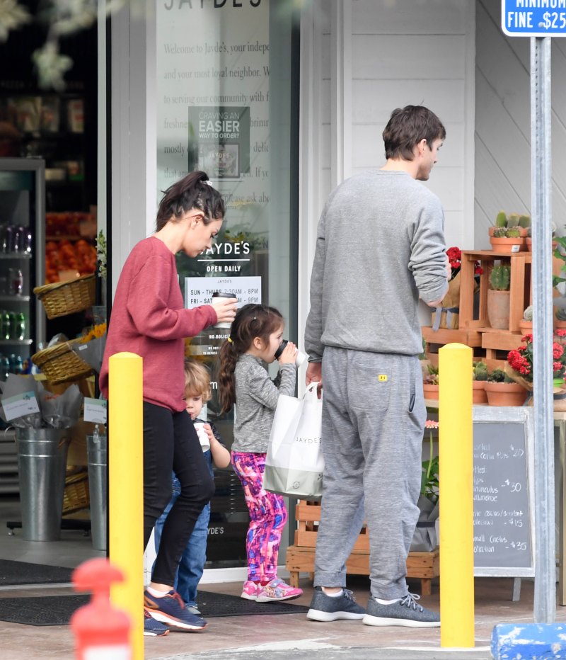Mila Kunis and Ashton Kutcher spotted grabbing coffee with their two children.