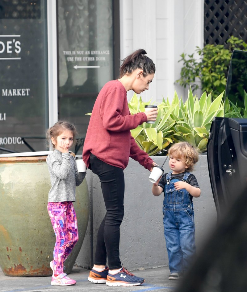 Mila Kunis and Ashton Kutcher spotted grabbing coffee with their two children.