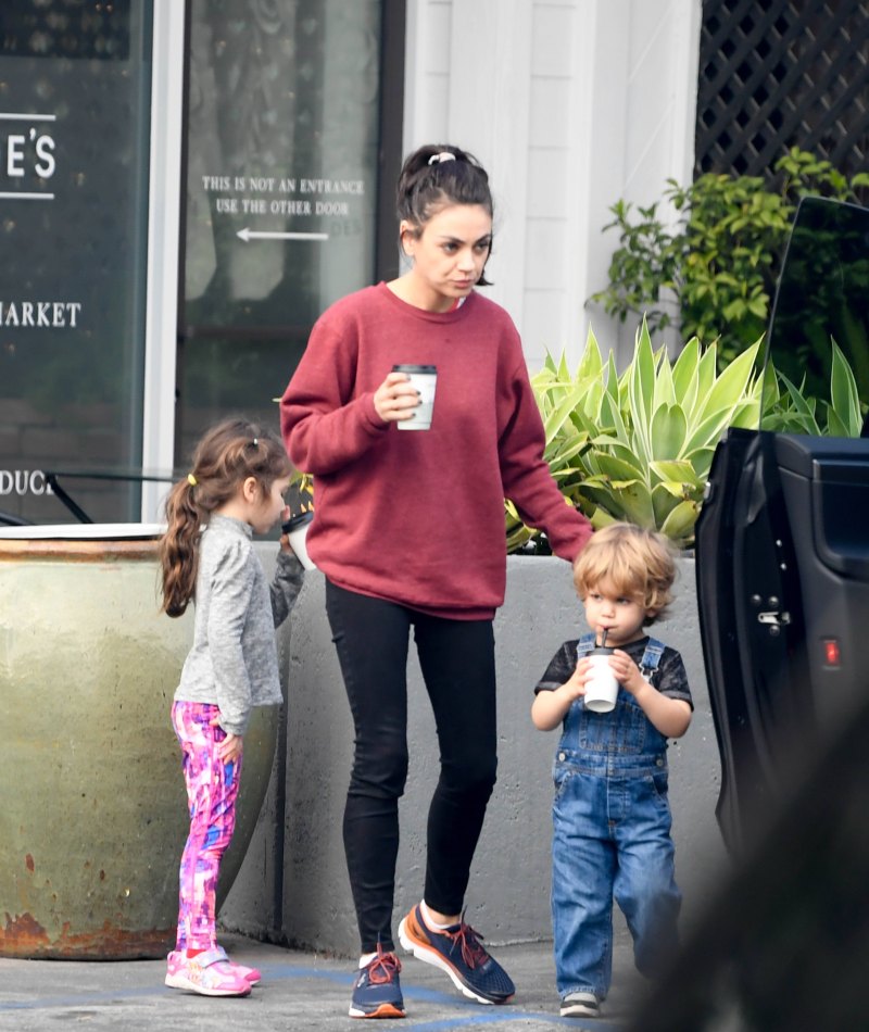 Mila Kunis and Ashton Kutcher spotted grabbing coffee with their two children.
